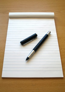 pen and blank lined paper