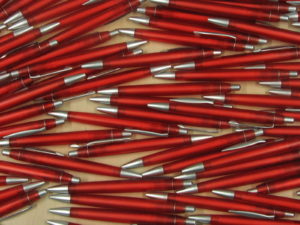 pile of red pens=