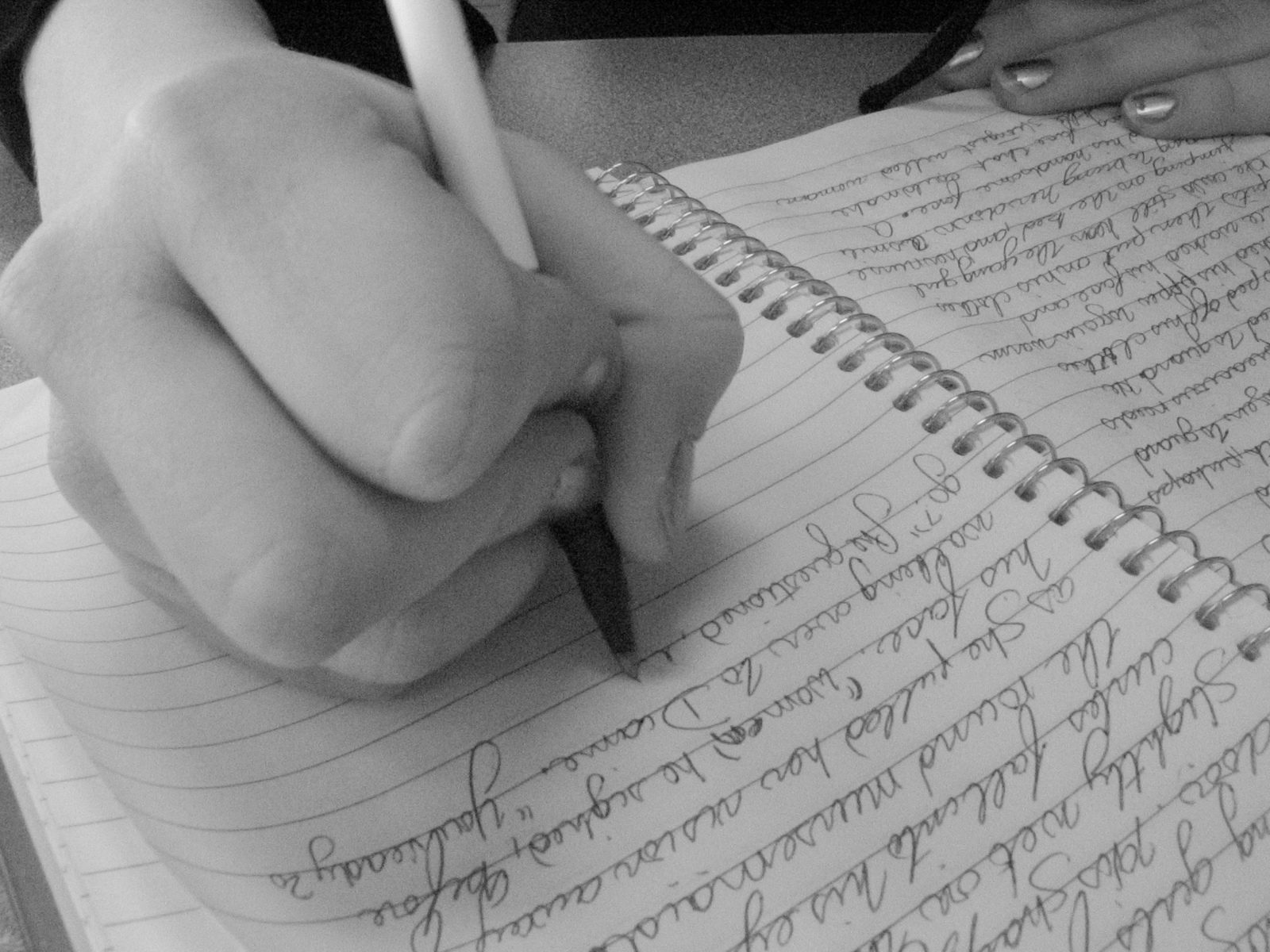 girl writing in notebook